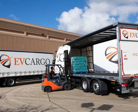 Forklift truck lifting items onto EV Cargo lorry